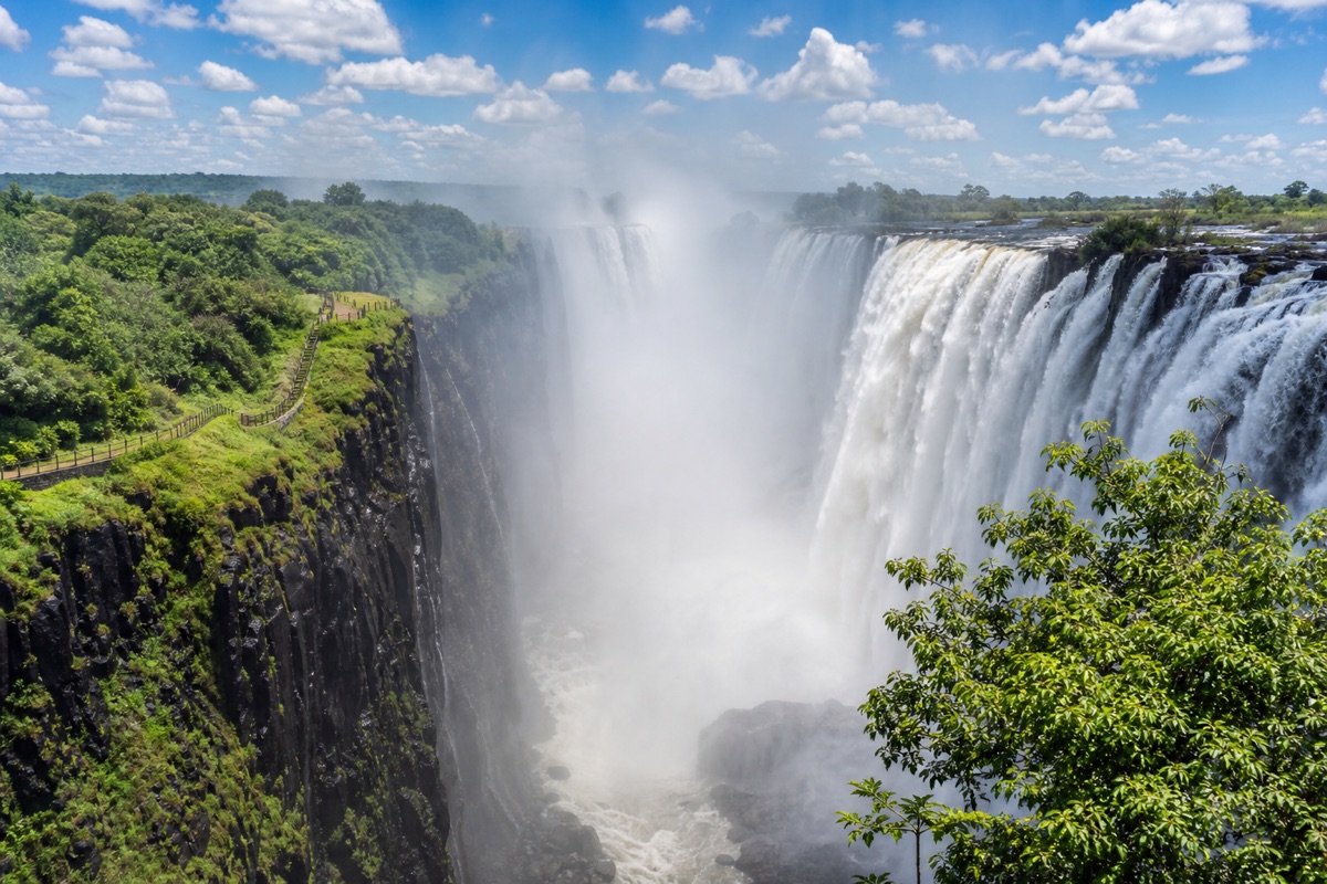 Victoria Falls viewed from the Zimbabwe side with mist rising from the gorge